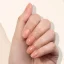 LONDONTOWN Kur Nail Veil No.5 zpevňující tónovaná péče na nehty Tlumená dýně 12 ml