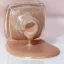 LONDONTOWN Kur Illuminating Nail Concealer Rozświetlacz do paznokci Bare beżowy 12 ml